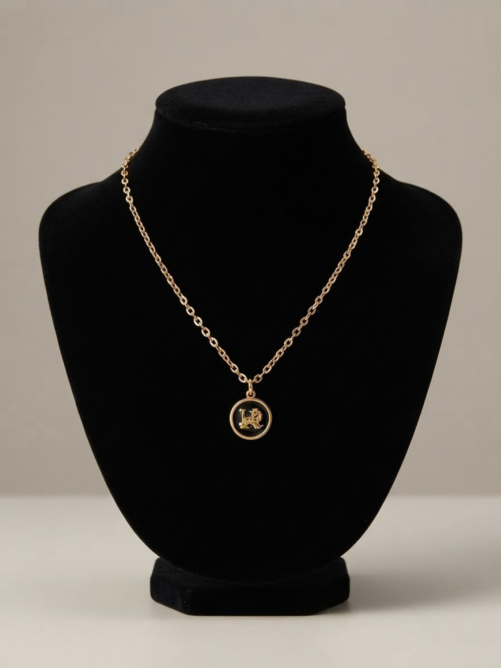 Lauren Ralph Lauren Gold-Plated Enamel Charm / Logo Medallion Necklace.